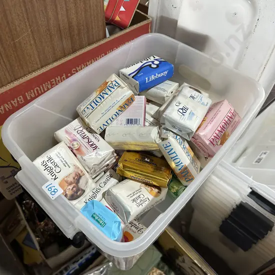 Lidded bin of soaps.