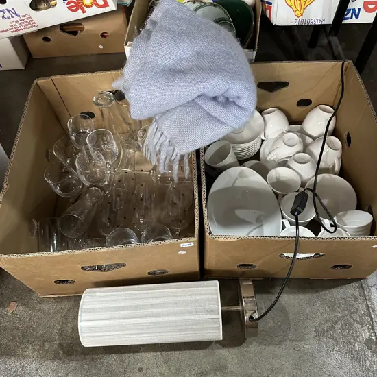Two boxes lamp, crockery, glasses and throw