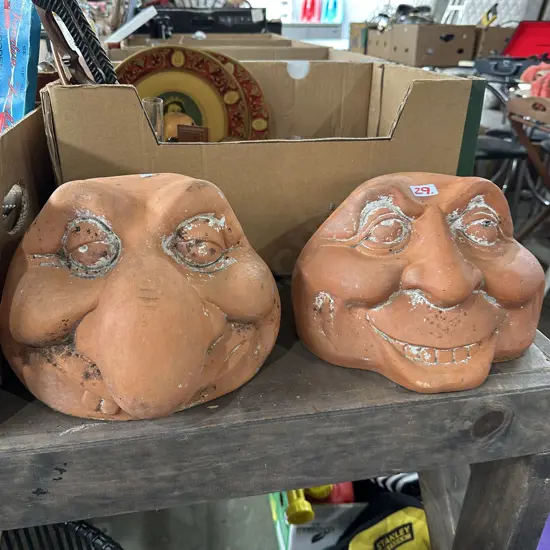 Pr of terracotta garden faces