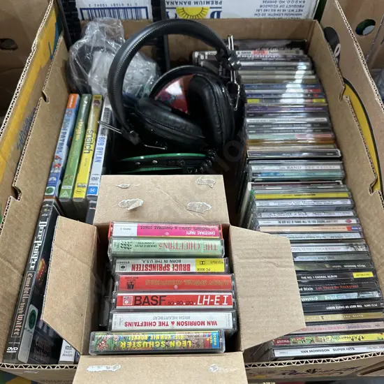 Box of assorted CDs, tapes, DVDs and headphones etc.