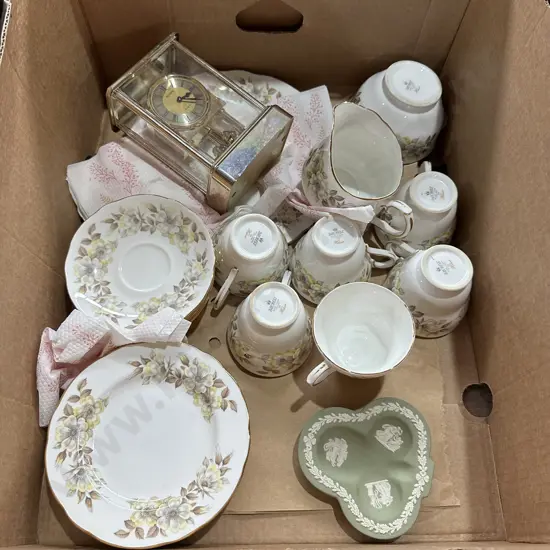 Clock and wedgewood plus Duchess tea set.