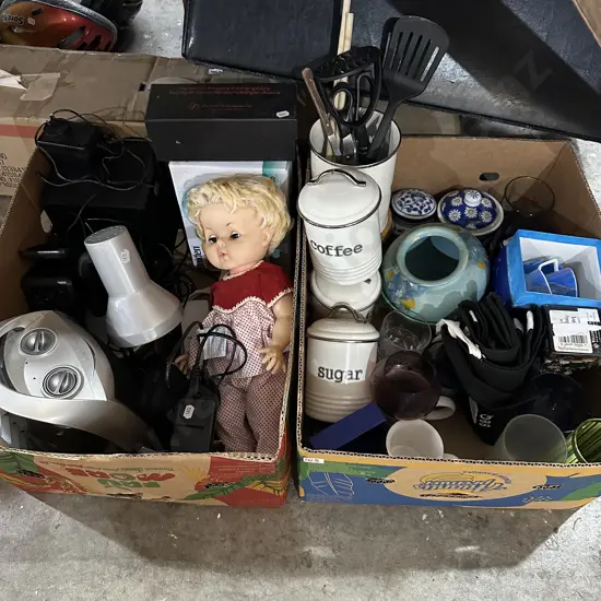 Two boxes computer speakers, doll, canisters etc.