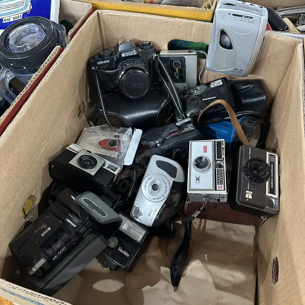 Assorted cameras and walkman tape player. Image 1++