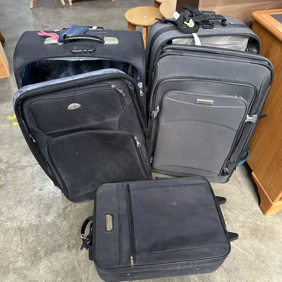 suitcases and day packs
