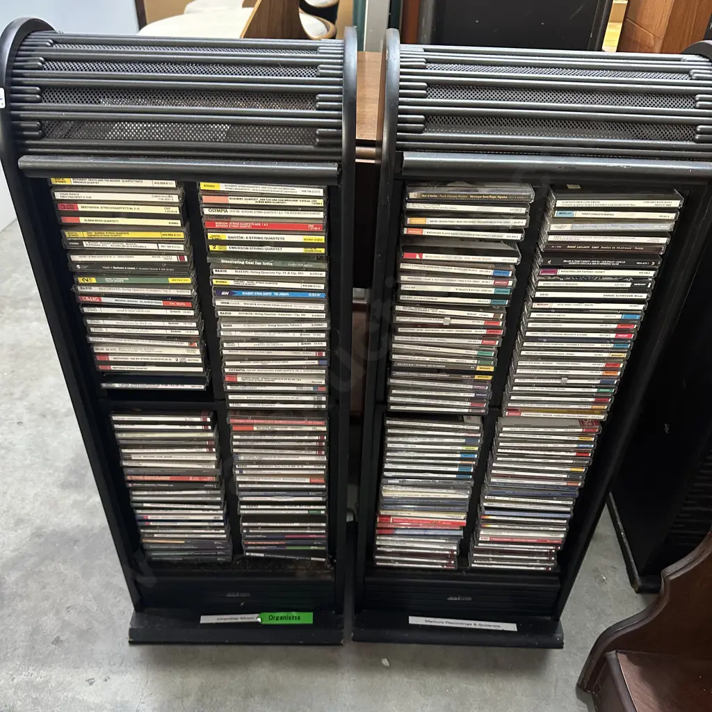 Pair CD racks plus CDs. Image 1++