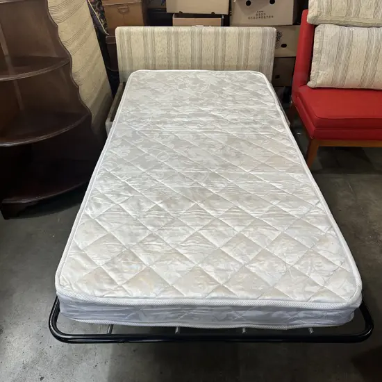 Two seater sofa bed.