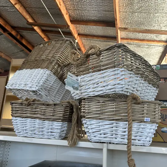 Four dipped willow baskets.