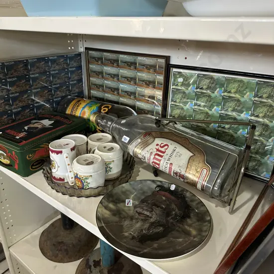 Shelf lot of collectables.