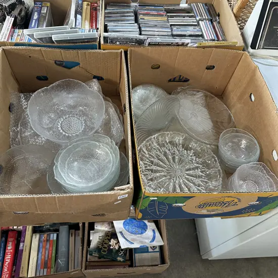 Two boxes of vintage glassware.