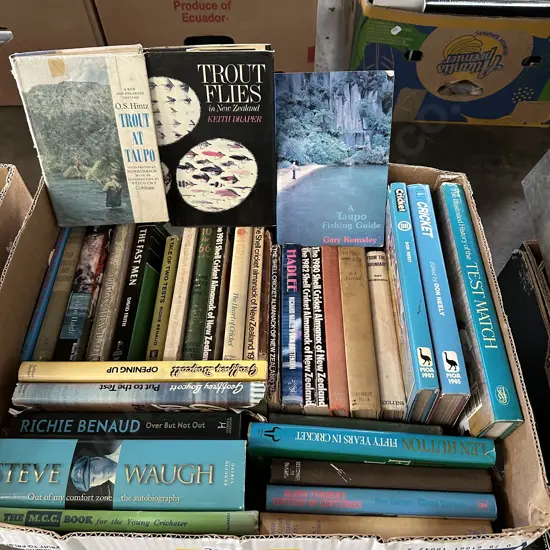 Box of cricket and trout fishing books etc.