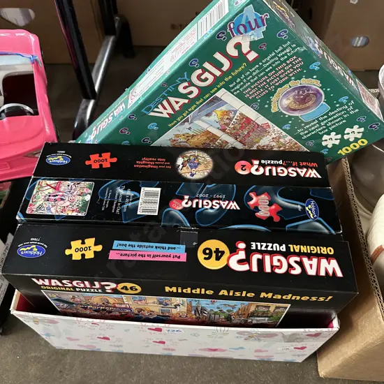 Four Wasgij puzzles.