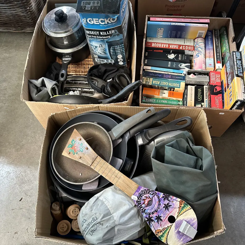 Three boxes books, pots and pans and insect killer etc. Image 1++