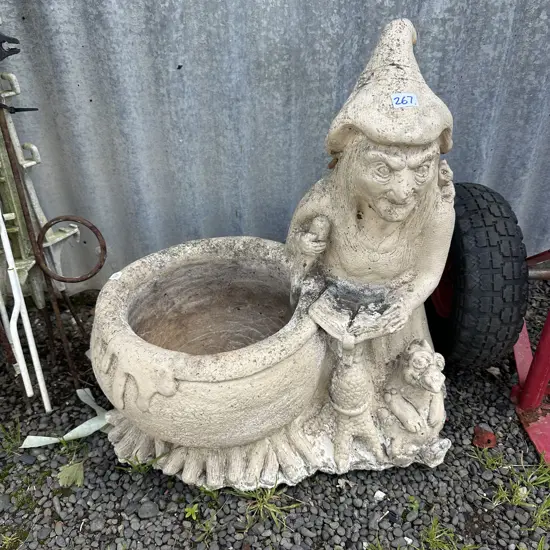Stone garden wizard and cauldron planter