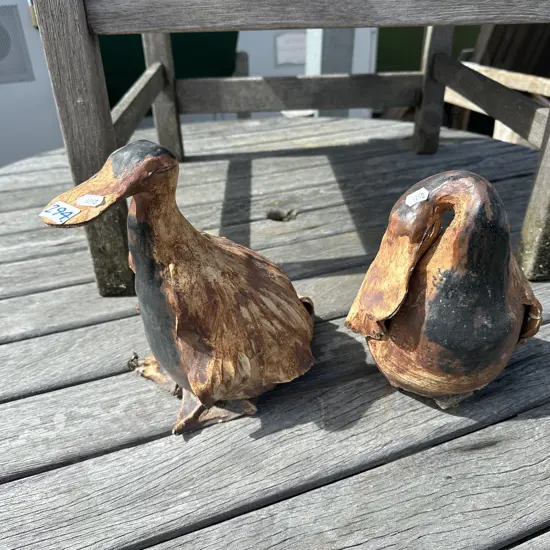 Two pottery ducks.