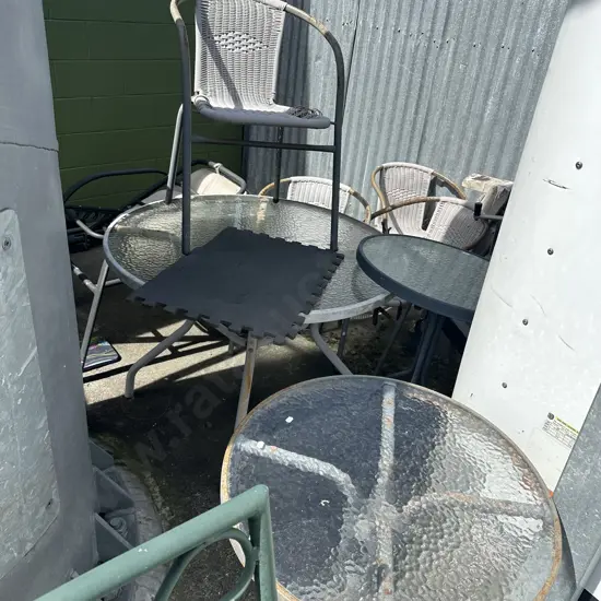 Large lot of average outdoor table and two patio tables plus chairs.