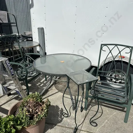 Glass table and two chairs plus plant stand.