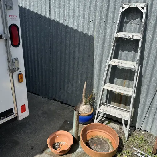 5 foot ladder, umbrella stand and planters.