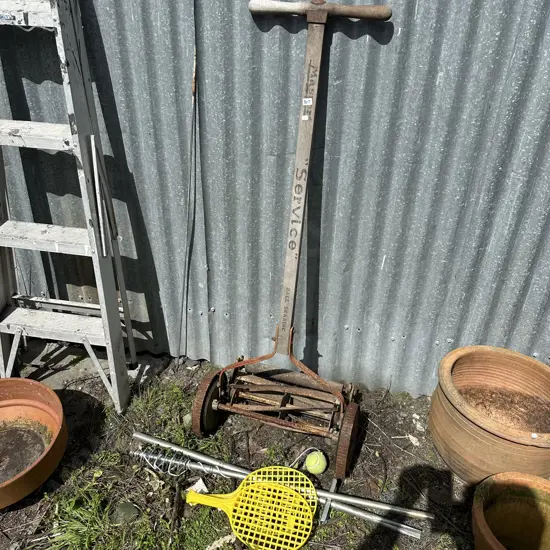 Push mower and swing ball.