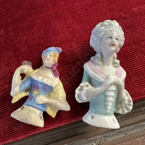 2 half dolls ( 1 damaged)