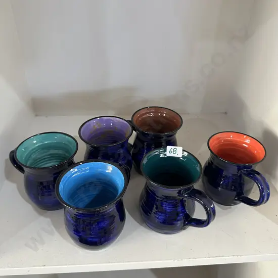 set of Ray Parker coffee mugs