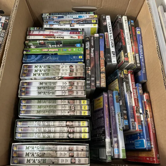 Box of DVDs including MASH box sets.