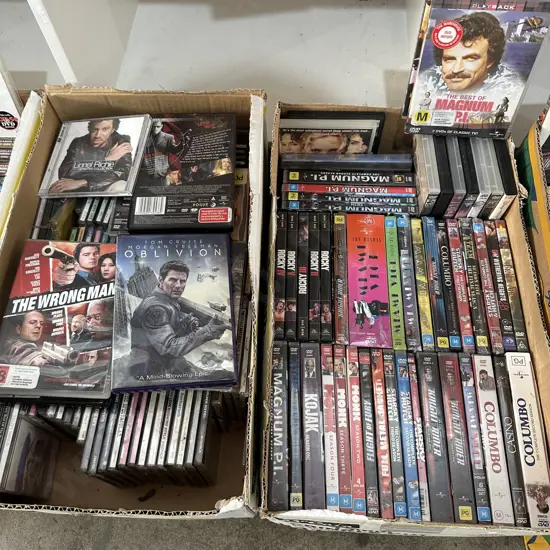 Two boxes of DVDs and CDs.