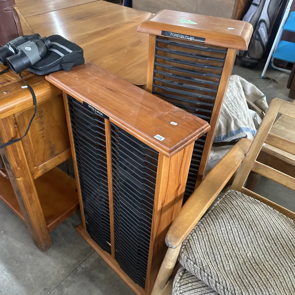 Two DVD racks. Image 1++