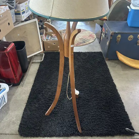 Vintage-style floor lamp and shade.