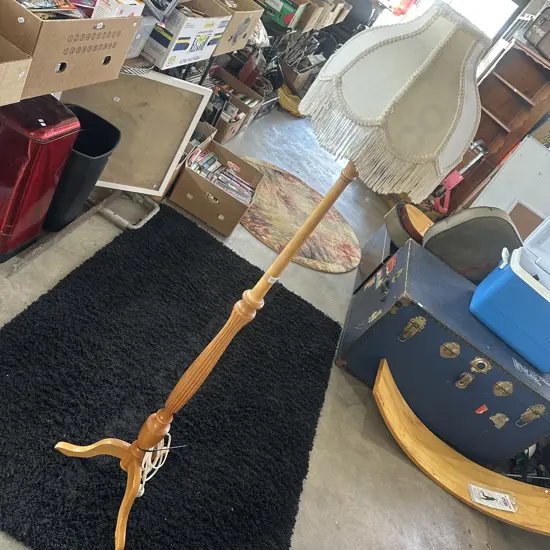 Vintage wooden floor lamp and shade.