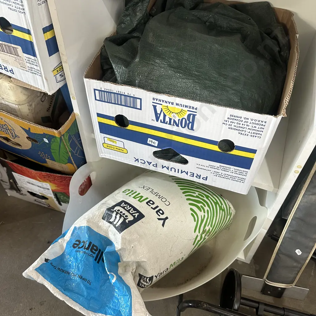 Tarp and fertilizer plus dog wash bucket. Image 1++