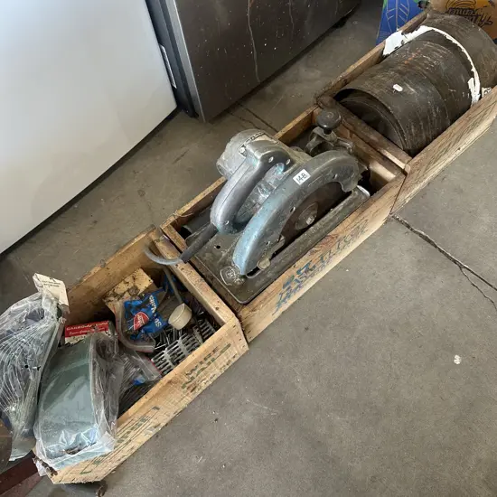 Three nail boxes plus skill saw, malthoid, four inch flat head nails and sander belts etc.