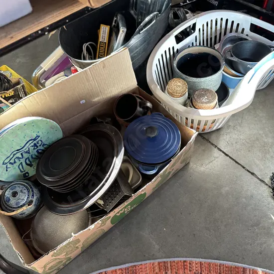 basket and box of cook and dinnerware