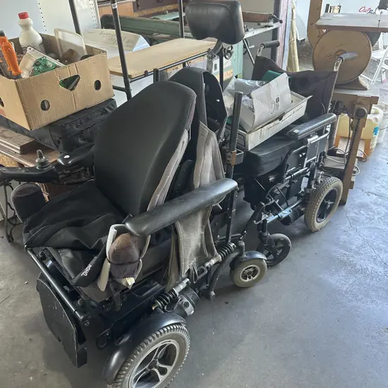 Two expensive wheelchairs and parts.