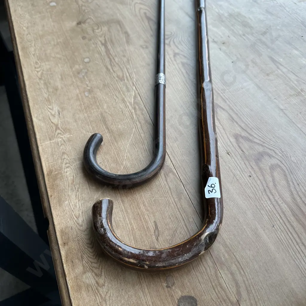 2 x walking sticks one with sterling band Image 1++