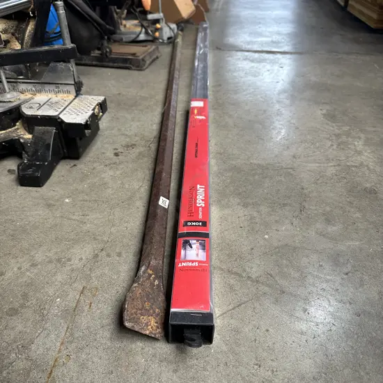 large metal bar, sliding rail