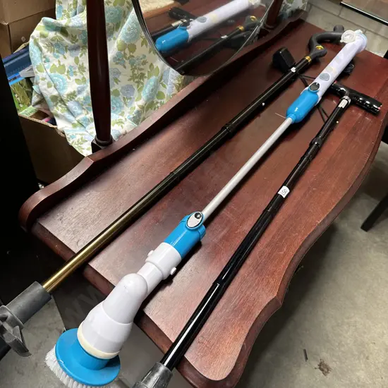 electric scrubber and 2 walking sticks