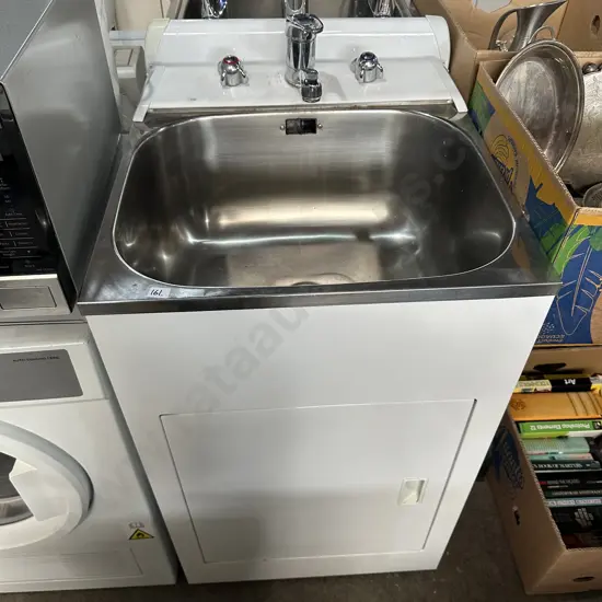 wash tub - painted rust around tap