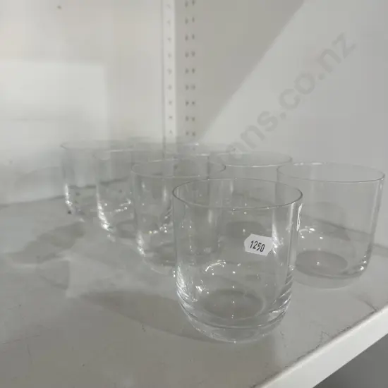 Set of eight whiskey glasses.