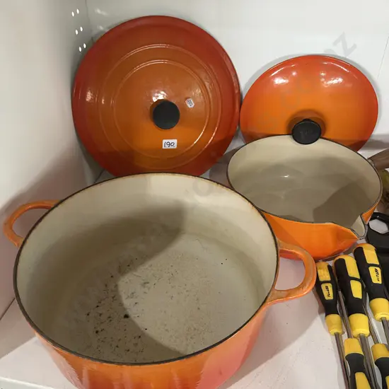 Le Creuset lidded casserole pot and saucepan.