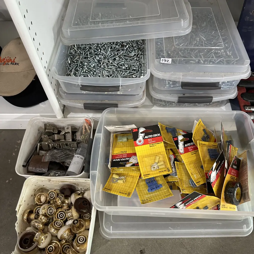 Five containers of screws and nails plus automotive connecters and hardware. Image 1++