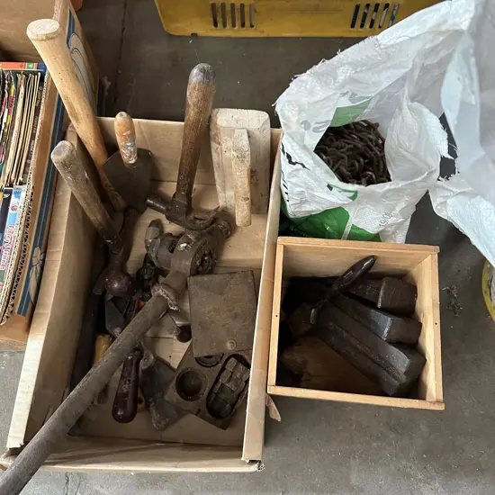Old tools, log splitters and chain.
