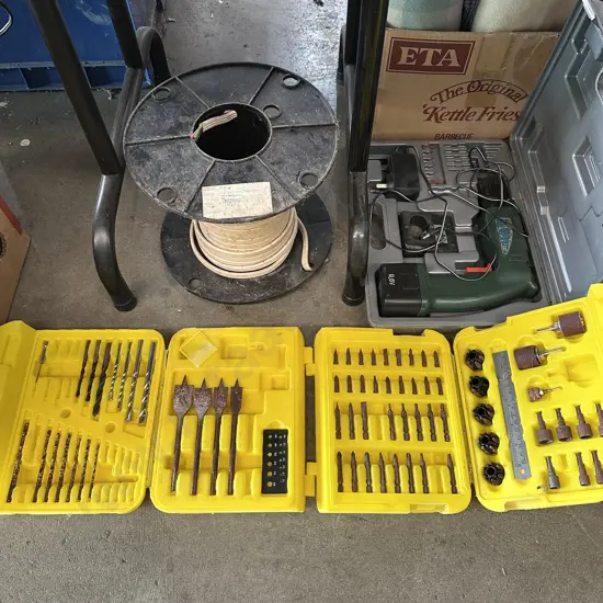 Battery drill, cable and cased bits.