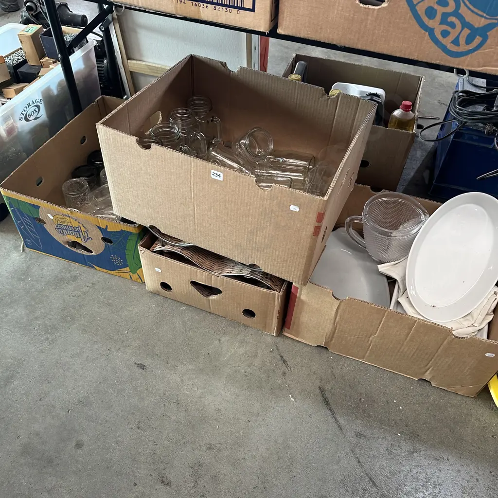 Four boxes of assorted items. Image 1++