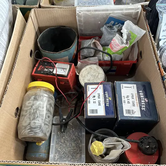 Battery charger, nails, screws and washers.