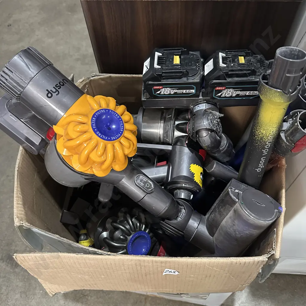 Box of Dyson spares plus two 18V Lithium-ion 6.0Ah batteries. Image 1++