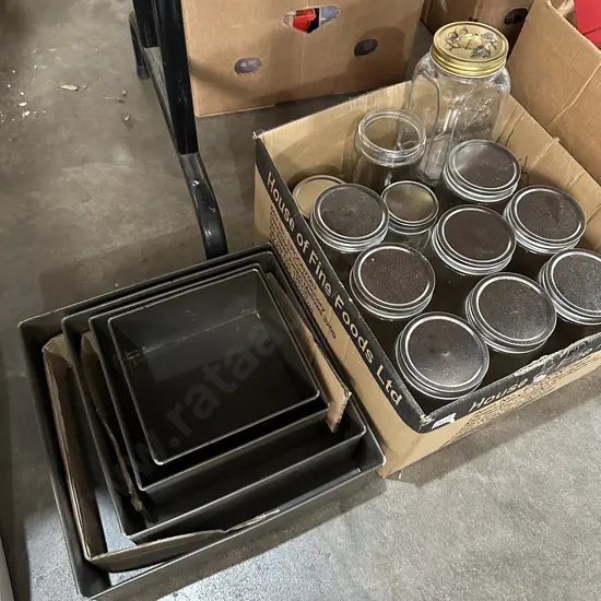 Clean lidded jars and large cake tins.