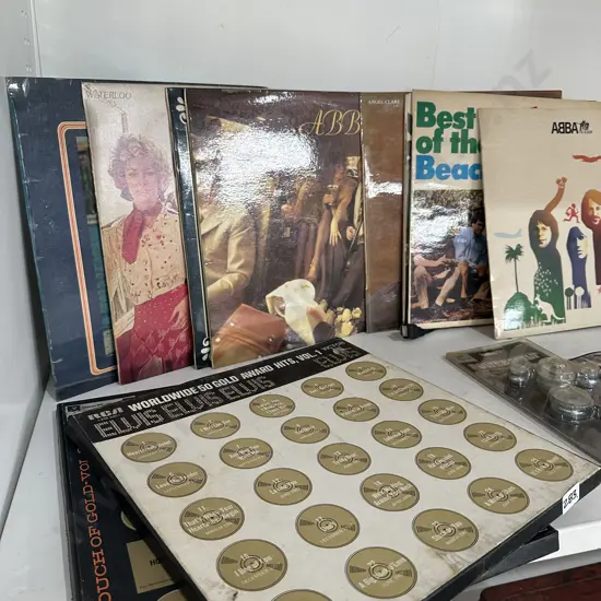 Selection of ABBA and Elvis LPs.