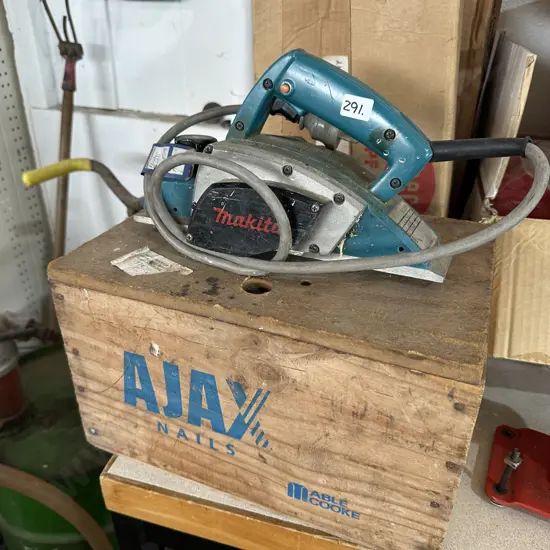 Makita planer and storage box.
