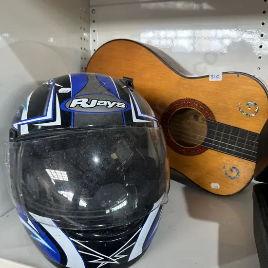 Guitar and motorbike helmet.