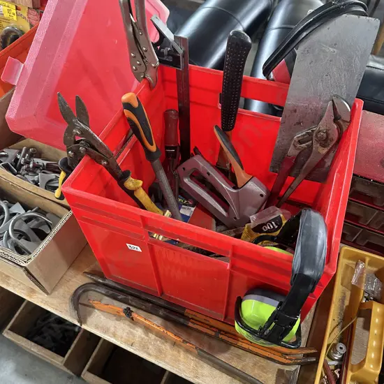 bin of tools and metal bars